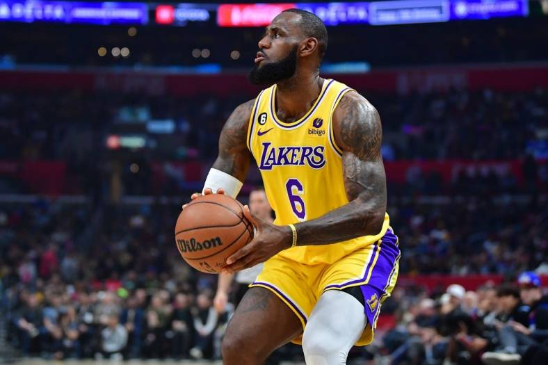 Nov 9, 2022; Los Angeles, California, USA; Los Angeles Lakers forward LeBron James (6) shoots against the Los Angeles Clippers during the first half at Crypto.com Arena. Mandatory Credit: Gary A. Vasquez-USA TODAY Sports