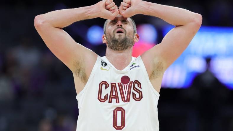 Nov 9, 2022; Sacramento, California, USA; Cleveland Cavaliers forward Kevin Love (0) reacts after a play during the fourth quarter against the Sacramento Kings at Golden 1 Center. Mandatory Credit: Sergio Estrada-USA TODAY Sports