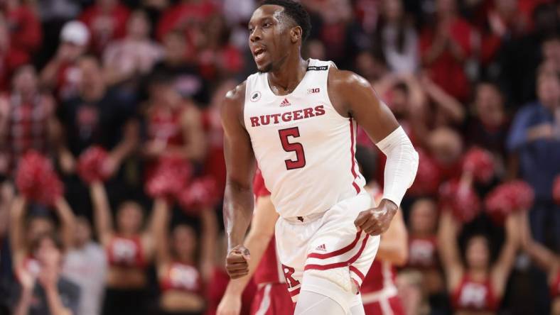 Nov 10, 2022; Piscataway, New Jersey, USA; Rutgers Scarlet Knights forward Aundre Hyatt (5) reacts after a three-point basket during the first half against the Sacred Heart Pioneers at Jersey Mike's Arena. Mandatory Credit: Vincent Carchietta-USA TODAY Sports