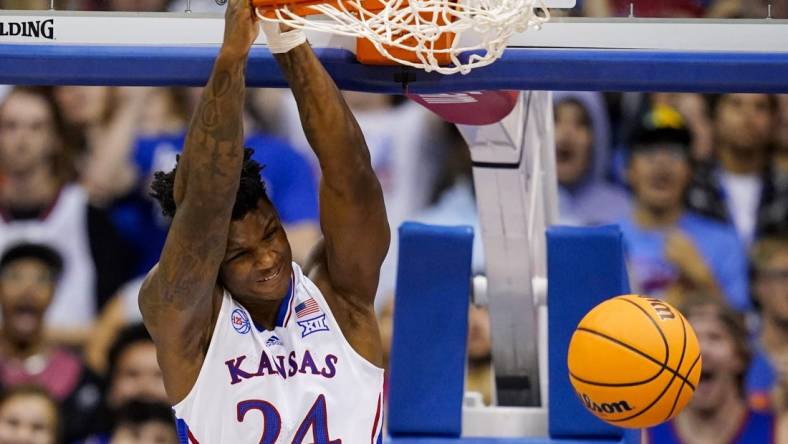 Nov 10, 2022; Lawrence, Kansas, USA; Kansas Jayhawks forward K.J. Adams Jr. (24) dunks the ball during the first half against the North Dakota State Bison at Allen Fieldhouse. Mandatory Credit: Jay Biggerstaff-USA TODAY Sports