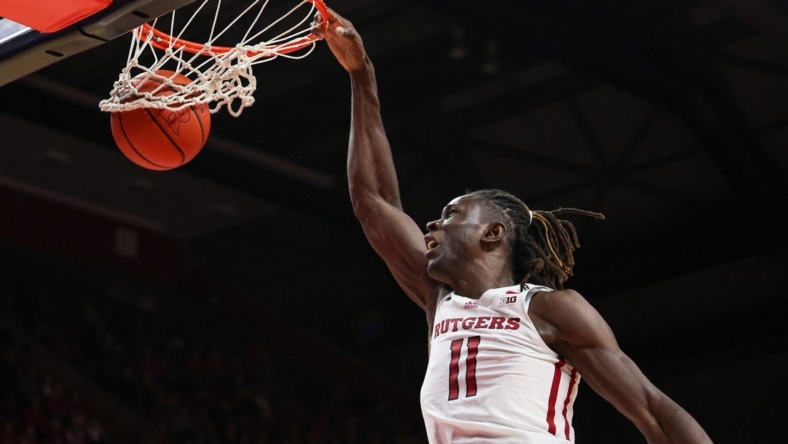 Nov 10, 2022; Piscataway, New Jersey, USA; Rutgers Scarlet Knights center Clifford Omoruyi (11) dunks against the Sacred Heart Pioneers during the second half at Jersey Mike's Arena. Mandatory Credit: Vincent Carchietta-USA TODAY Sports