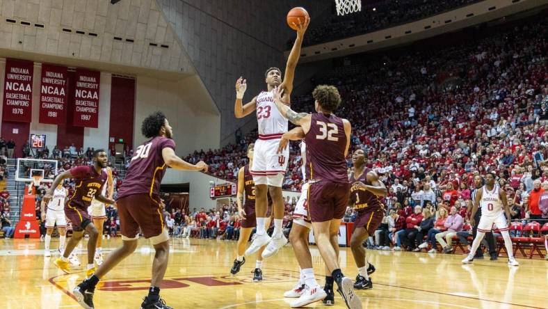 Nov 10, 2022; Bloomington, Indiana, USA; Indiana Hoosiers forward Trayce Jackson-Davis (23) shoots the ball while Bethune-Cookman Wildcats center Elijah Hulsewe (32) defends in the first half at Simon Skjodt Assembly Hall. Mandatory Credit: Trevor Ruszkowski-USA TODAY Sports