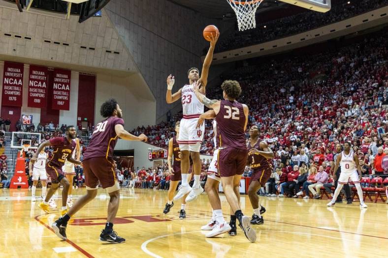 Nov 10, 2022; Bloomington, Indiana, USA; Indiana Hoosiers forward Trayce Jackson-Davis (23) shoots the ball while Bethune-Cookman Wildcats center Elijah Hulsewe (32) defends in the first half at Simon Skjodt Assembly Hall. Mandatory Credit: Trevor Ruszkowski-USA TODAY Sports