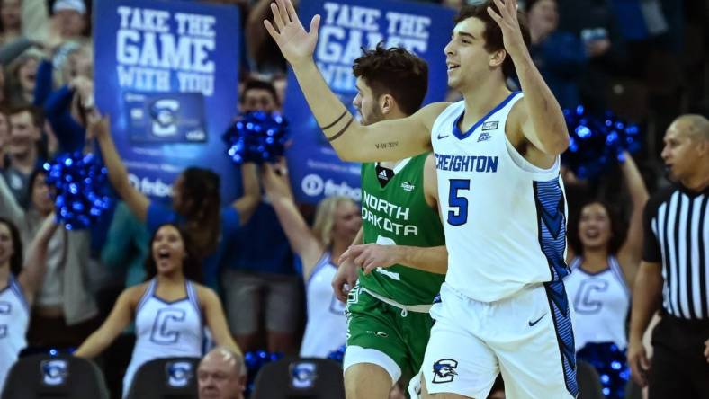 Nov 10, 2022; Omaha, Nebraska, USA; Creighton Bluejays guard Francisco Farabello (5) celebrates after a three-point basket against the North Dakota Fighting Hawks during the first half at CHI Health Center Omaha. Mandatory Credit: Steven Branscombe-USA TODAY Sports