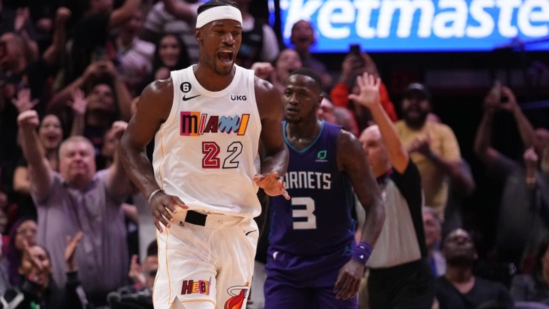 Nov 10, 2022; Miami, Florida, USA; Miami Heat forward Jimmy Butler (22) reacts after making a shot against the Charlotte Hornets during the second half at FTX Arena. Mandatory Credit: Jasen Vinlove-USA TODAY Sports