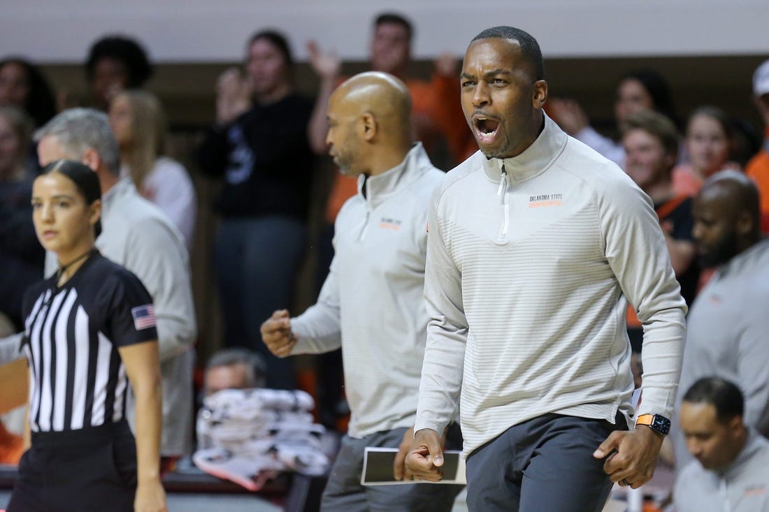 Head coach Mike Boynton stands on the sidelines in the second half during a college basketball game between the Oklahoma State Cowboys (OSU) and the Southern Illinois Salukis at Gallagher-Iba Arena in Stillwater, Okla., Thursday, Nov. 10, 2022.

Osu Vs Southern Illinois