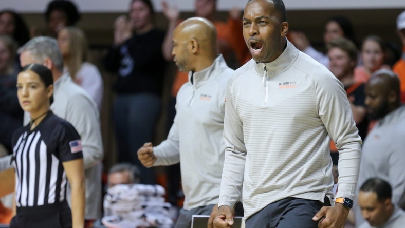 Head coach Mike Boynton stands on the sidelines in the second half during a college basketball game between the Oklahoma State Cowboys (OSU) and the Southern Illinois Salukis at Gallagher-Iba Arena in Stillwater, Okla., Thursday, Nov. 10, 2022.

Osu Vs Southern Illinois