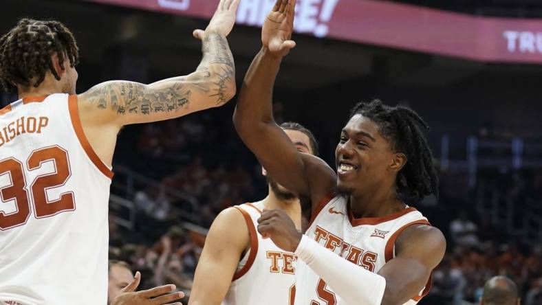 Nov 10, 2022; Austin, Texas, USA; Texas Longhorns guard guard Marcus Carr (5) reacts from the bench during the second half against the Houston Christian Huskies at Moody Center. Mandatory Credit: Scott Wachter-USA TODAY Sports