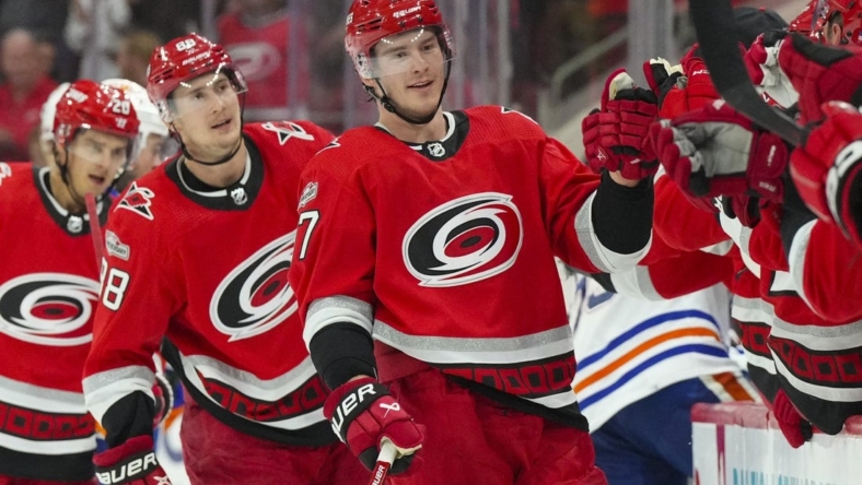 Nov 10, 2022; Raleigh, North Carolina, USA; Carolina Hurricanes right wing Andrei Svechnikov (37) celebrates his third goal of the game against the Edmonton Oilers during the third period at PNC Arena. Mandatory Credit: James Guillory-USA TODAY Sports