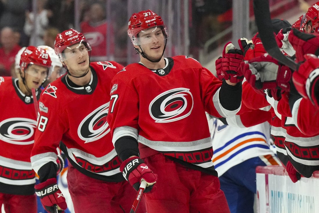 Nov 10, 2022; Raleigh, North Carolina, USA; Carolina Hurricanes right wing Andrei Svechnikov (37) celebrates his third goal of the game against the Edmonton Oilers during the third period at PNC Arena. Mandatory Credit: James Guillory-USA TODAY Sports