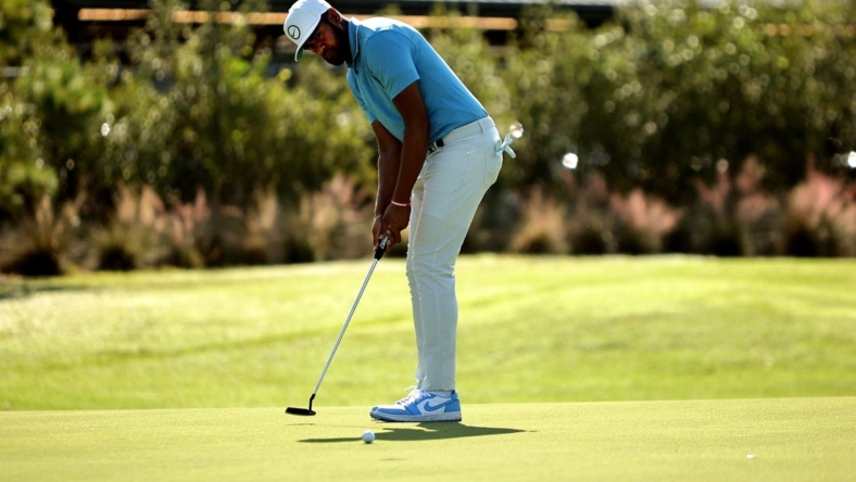 Nov 11, 2022; Houston, Texas, USA; Tony Finau takes a putt on the green of the ninth hole during the second round of the Cadence Bank Houston Open golf tournament. Mandatory Credit: Erik Williams-USA TODAY Sports