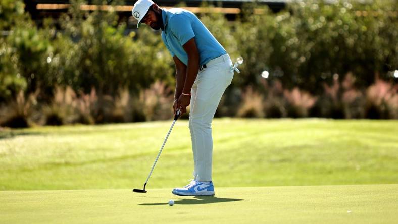 Nov 11, 2022; Houston, Texas, USA; Tony Finau takes a putt on the green of the ninth hole during the second round of the Cadence Bank Houston Open golf tournament. Mandatory Credit: Erik Williams-USA TODAY Sports