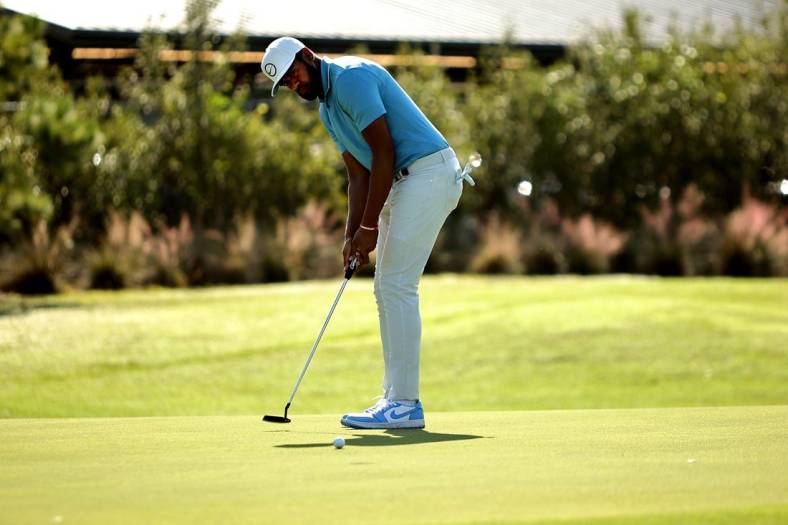 Nov 11, 2022; Houston, Texas, USA; Tony Finau takes a putt on the green of the ninth hole during the second round of the Cadence Bank Houston Open golf tournament. Mandatory Credit: Erik Williams-USA TODAY Sports