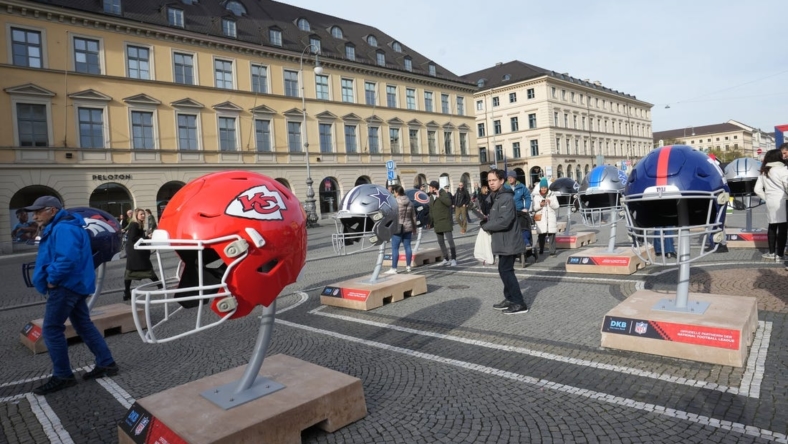 Nov 11, 2022; Munich, Germany; Large helmets of the Kansas City Chiefs, Dallas Cowboys and New York Giants during fan activation event at Odeonsplatz. Mandatory Credit: Kirby Lee-USA TODAY Sports