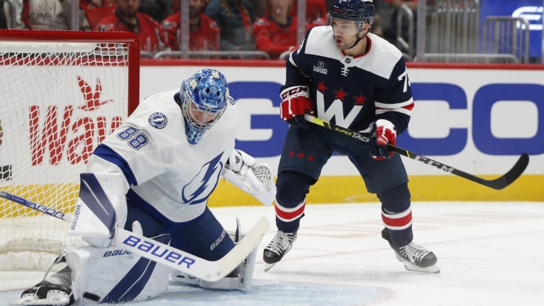 Nov 11, 2022; Washington, District of Columbia, USA; Tampa Bay Lightning goaltender Andrei Vasilevskiy (88) makes a save against Washington Capitals left wing Conor Sheary (73) during the first period at Capital One Arena. Mandatory Credit: Amber Searls-USA TODAY Sports