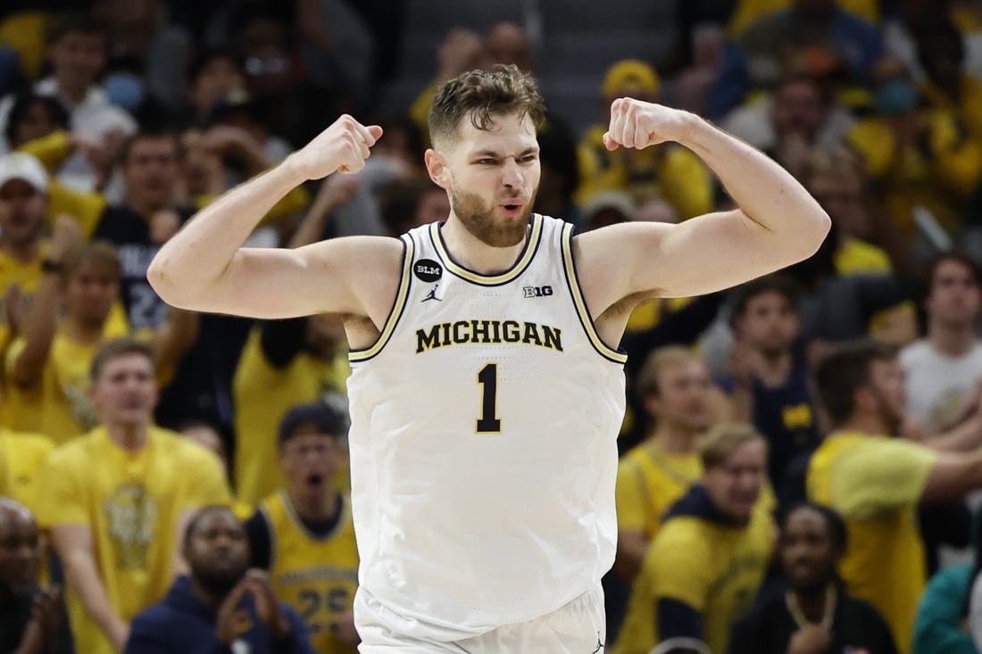 Nov 11, 2022; Detroit, Michigan, USA;  Michigan Wolverines center Hunter Dickinson (1) celebrates during the second half against the Eastern Michigan Eagles at Little Caesars Arena. Mandatory Credit: Rick Osentoski-USA TODAY Sports