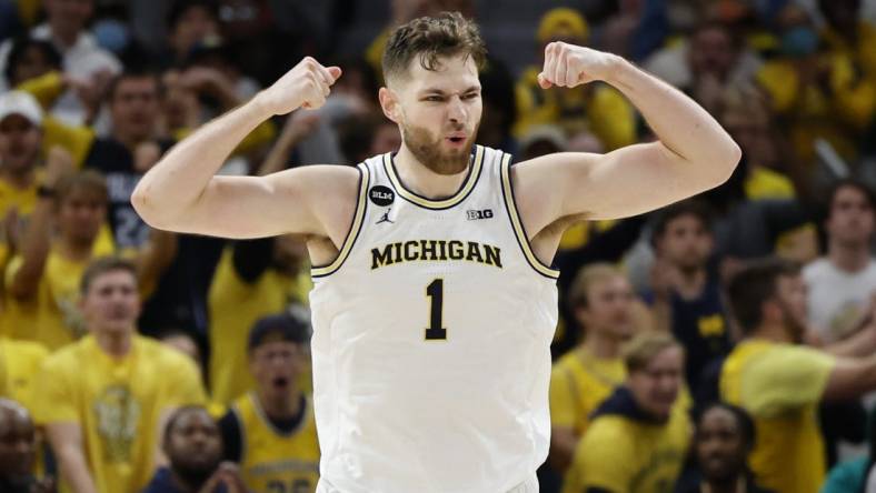 Nov 11, 2022; Detroit, Michigan, USA;  Michigan Wolverines center Hunter Dickinson (1) celebrates during the second half against the Eastern Michigan Eagles at Little Caesars Arena. Mandatory Credit: Rick Osentoski-USA TODAY Sports