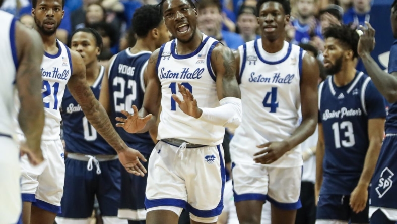 Nov 12, 2022; Newark, New Jersey, USA;  Seton Hall Pirates forward KC Ndefo (13) reacts after scoring and being fouled in the first half against the St. Peter's Peacocks on at Prudential Center. Mandatory Credit: Wendell Cruz-USA TODAY Sports