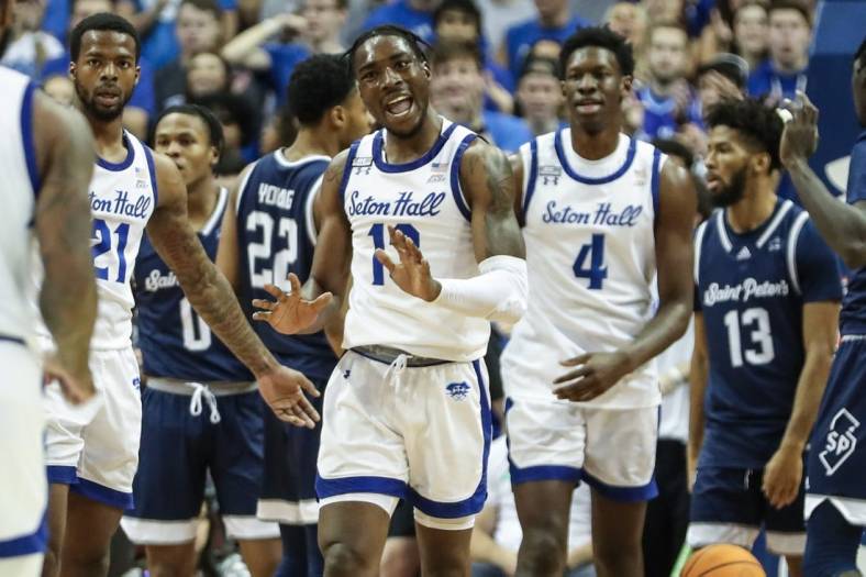 Nov 12, 2022; Newark, New Jersey, USA;  Seton Hall Pirates forward KC Ndefo (13) reacts after scoring and being fouled in the first half against the St. Peter's Peacocks on at Prudential Center. Mandatory Credit: Wendell Cruz-USA TODAY Sports