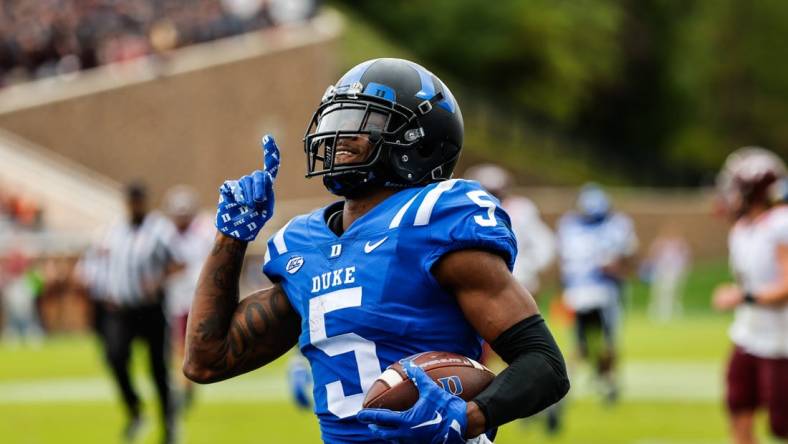 Nov 12, 2022; Durham, North Carolina, USA;  Duke Blue Devils wide receiver Jalon Calhoun (5) makes a touchdown  during the first half against Virginia Tech at Wallace Wade Stadium. Mandatory Credit: Jaylynn Nash-USA TODAY Sports