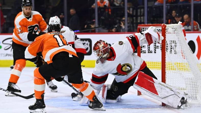 Nov 12, 2022; Philadelphia, Pennsylvania, USA; Ottawa Senators goalie Cam Talbot (33) saves a shot from Philadelphia Flyers right wing Travis Konecny (11) in the first period at Wells Fargo Center. Mandatory Credit: Kyle Ross-USA TODAY Sports