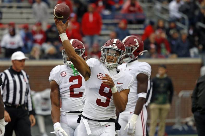 Nov 12, 2022; Oxford, Mississippi, USA; Alabama Crimson Tide quarterback Bryce Young (9) passes the ball during warm up prior to the game against the Mississippi Rebels at Vaught-Hemingway Stadium. Mandatory Credit: Petre Thomas-USA TODAY Sports