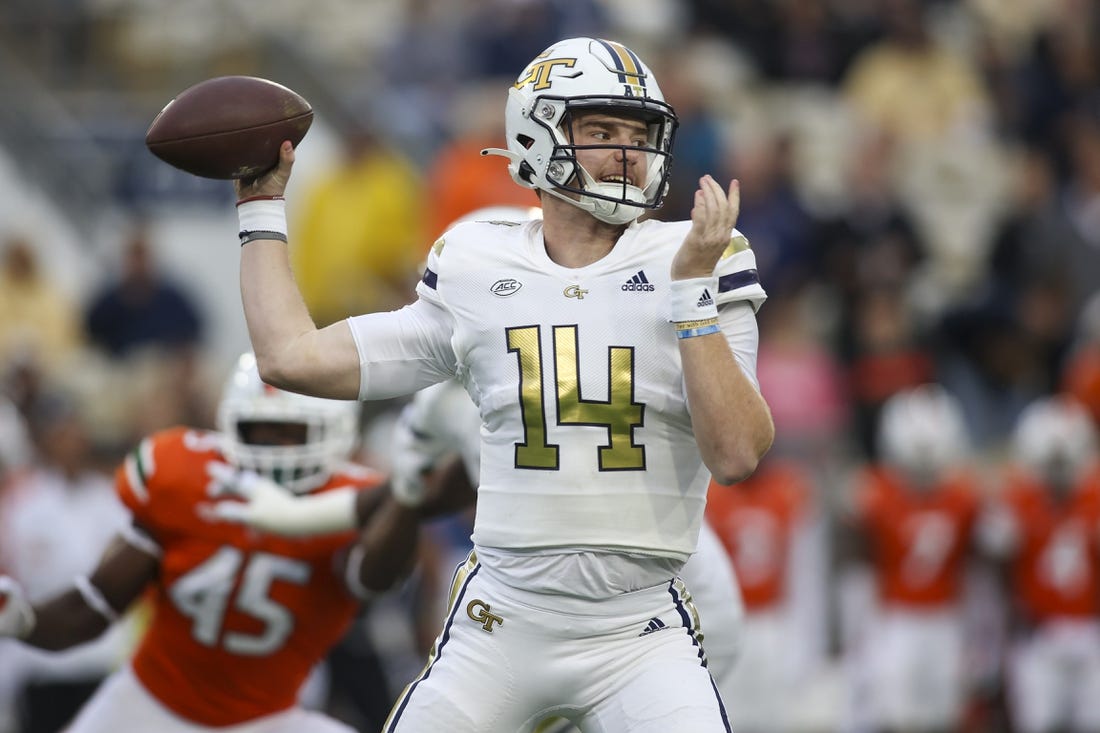 Nov 12, 2022; Atlanta, Georgia, USA; Georgia Tech Yellow Jackets quarterback Zach Pyron (14) throws a pass against the Miami Hurricanes in the first quarter at Bobby Dodd Stadium. Mandatory Credit: Brett Davis-USA TODAY Sports