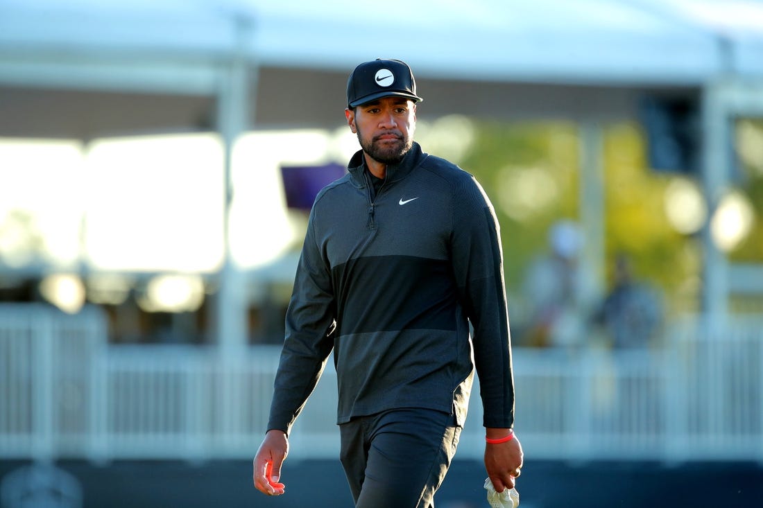 Nov 12, 2022; Houston, Texas, USA; Tony Finau stands on the green of the eighteenth hole during the third round of the Cadence Bank Houston Open golf tournament. Mandatory Credit: Erik Williams-USA TODAY Sports