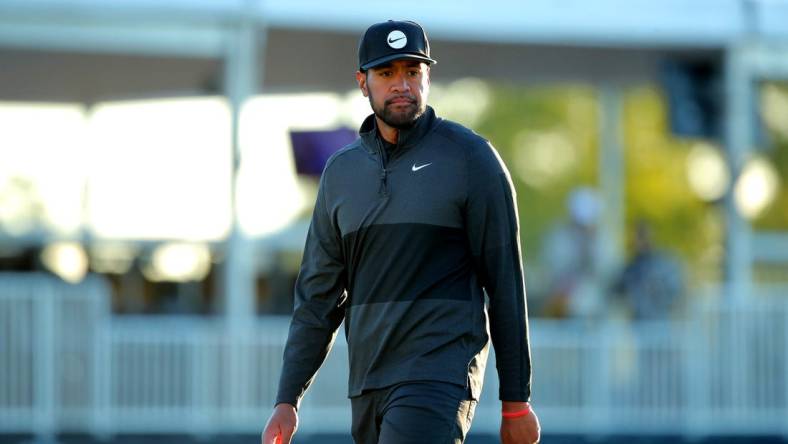 Nov 12, 2022; Houston, Texas, USA; Tony Finau stands on the green of the eighteenth hole during the third round of the Cadence Bank Houston Open golf tournament. Mandatory Credit: Erik Williams-USA TODAY Sports