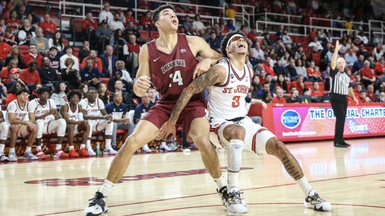 Nov 15, 2022; Queens, New York, USA;  Lafayette Leopards forward Kyle Jenkins (14) and St. John's Red Storm guard Andre Curbelo (3) battle for a rebound in the first half at Carnesecca Arena. Mandatory Credit: Wendell Cruz-USA TODAY Sports