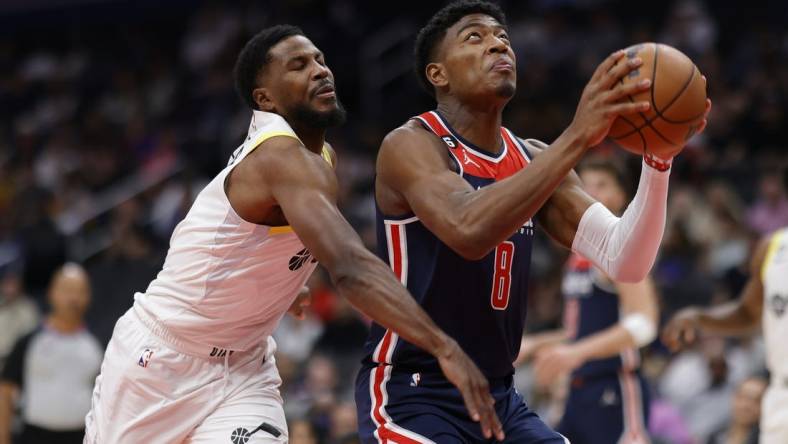 Nov 12, 2022; Washington, District of Columbia, USA; Washington Wizards forward Rui Hachimura (8) dribbles the ball as Utah Jazz guard Malik Beasley (5) defends in the first quarter at Capital One Arena. Mandatory Credit: Geoff Burke-USA TODAY Sports