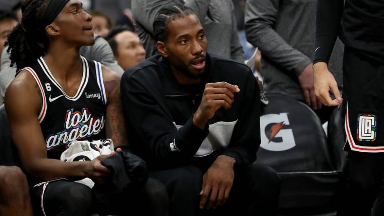 Nov 12, 2022; Los Angeles, California, USA;  Los Angeles Clippers forward Kawhi Leonard (2) watches a game during the second half against the Brooklyn Nets at Crypto.com Arena. Mandatory Credit: Kiyoshi Mio-USA TODAY Sports