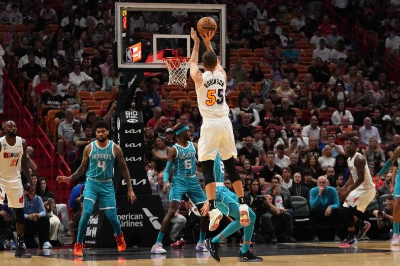 Nov 12, 2022; Miami, Florida, USA; Miami Heat guard Duncan Robinson (55) puts up a shot against the Charlotte Hornets during the first half at FTX Arena. Mandatory Credit: Jasen Vinlove-USA TODAY Sports