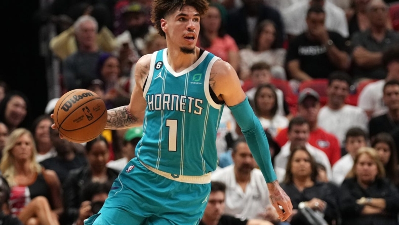 Nov 12, 2022; Miami, Florida, USA; Charlotte Hornets guard LaMelo Ball (1) controls the ball against the Miami Heat during the first half at FTX Arena. Mandatory Credit: Jasen Vinlove-USA TODAY Sports