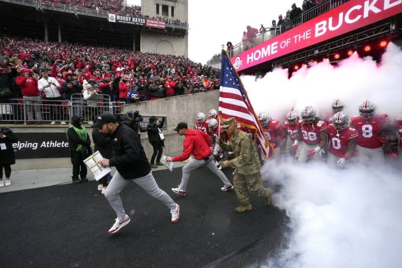 Nov 12, 2022; Columbus, Ohio, USA; The Ohio State Buckeyes take the field led by head coach Ryan Day before a game against the Indiana Hoosiers at Ohio Stadium. Mandatory Credit: Brooke LaValley-The Columbus Dispatch via USA TODAY NETWORK