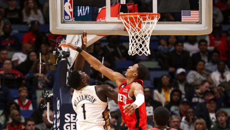 Nov 12, 2022; New Orleans, Louisiana, USA;  New Orleans Pelicans forward Zion Williamson (1) shoots over Houston Rockets forward Jabari Smith Jr. (1) during the first half at Smoothie King Center. Mandatory Credit: Stephen Lew-USA TODAY Sports