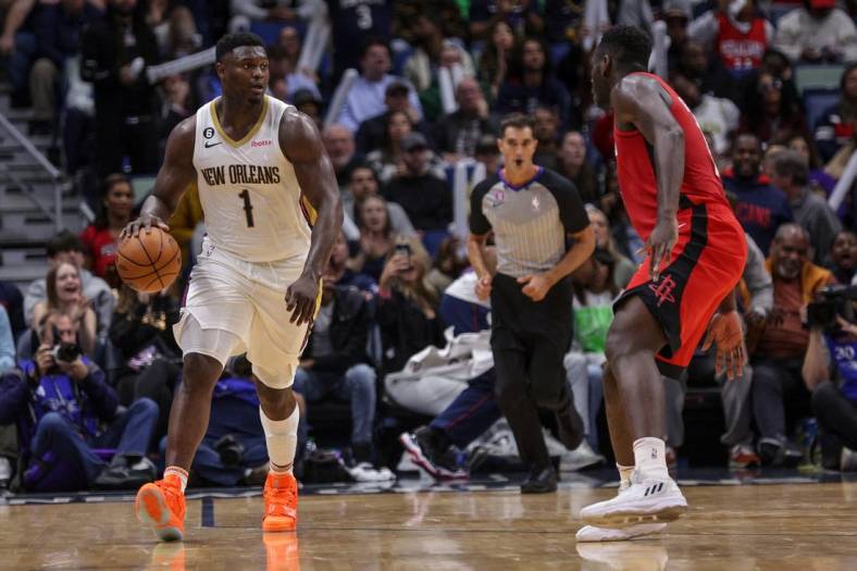 Nov 12, 2022; New Orleans, Louisiana, USA;  New Orleans Pelicans forward Zion Williamson (1) dribbles against the Houston Rockets during the second half at Smoothie King Center. Mandatory Credit: Stephen Lew-USA TODAY Sports