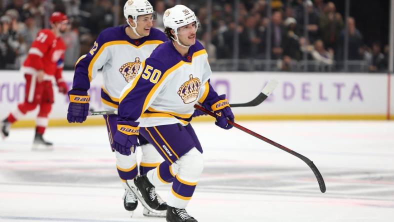 Nov 12, 2022; Los Angeles, California, USA;  Los Angeles Kings defenseman Sean Durzi (50) skates back to the bench after his second goal of the game during the second period against the Detroit Red Wings at Crypto.com Arena. Mandatory Credit: Kiyoshi Mio-USA TODAY Sports