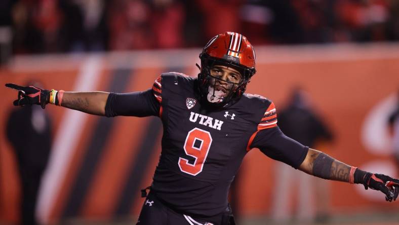 Nov 12, 2022; Salt Lake City, Utah, USA; Utah Utes running back Tavion Thomas (9) celebrates a touchdown against the Stanford Cardinal in the fourth quarter at Rice-Eccles Stadium. Mandatory Credit: Rob Gray-USA TODAY Sports