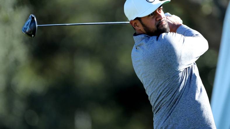 Nov 13, 2022; Houston, Texas, USA; Tony Finau hits a tee shot at the first hole during the final round of the Cadence Bank Houston Open golf tournament. Mandatory Credit: Erik Williams-USA TODAY Sports