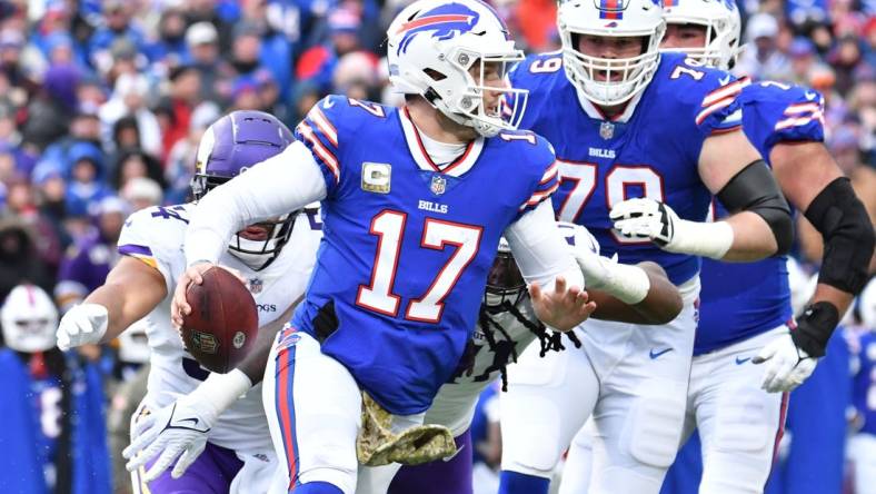 Nov 13, 2022; Orchard Park, New York, USA; Buffalo Bills quarterback Josh Allen (17) runs out of thr pocket against the Minnesota Vikings in the second quarter at Highmark Stadium. Mandatory Credit: Mark Konezny-USA TODAY Sports