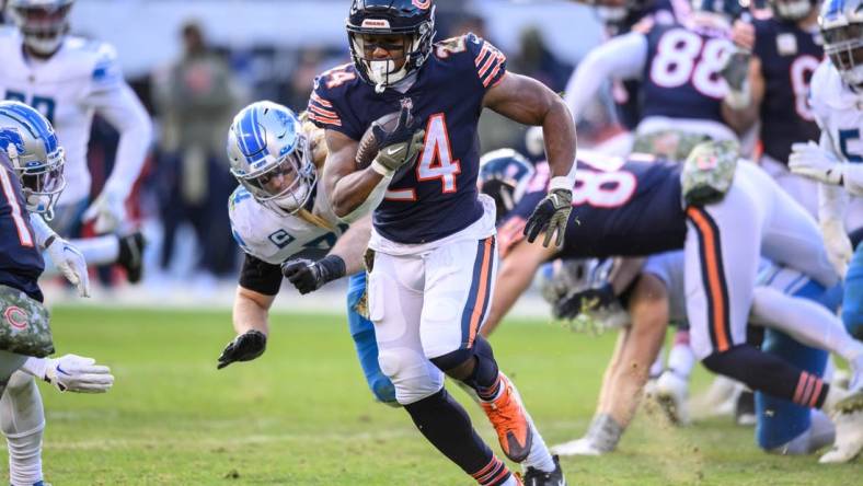 Nov 13, 2022; Chicago, Illinois, USA; Chicago Bears running back Khalil Herbert (24) runs the ball in the fourth quarter against the Detroit Lions at Soldier Field. Mandatory Credit: Daniel Bartel-USA TODAY Sports