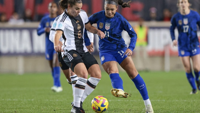 Nov 13, 2022; Harrison, New Jersey, USA; United States forward Sophia Smith (11) plays the ball against Germany forward Lena Oberdorf (6) uring the first half at Red Bull Arena. Mandatory Credit: Vincent Carchietta-USA TODAY Sports