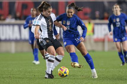 Nov 13, 2022; Harrison, New Jersey, USA; United States forward Sophia Smith (11) plays the ball against Germany forward Lena Oberdorf (6) uring the first half at Red Bull Arena. Mandatory Credit: Vincent Carchietta-USA TODAY Sports