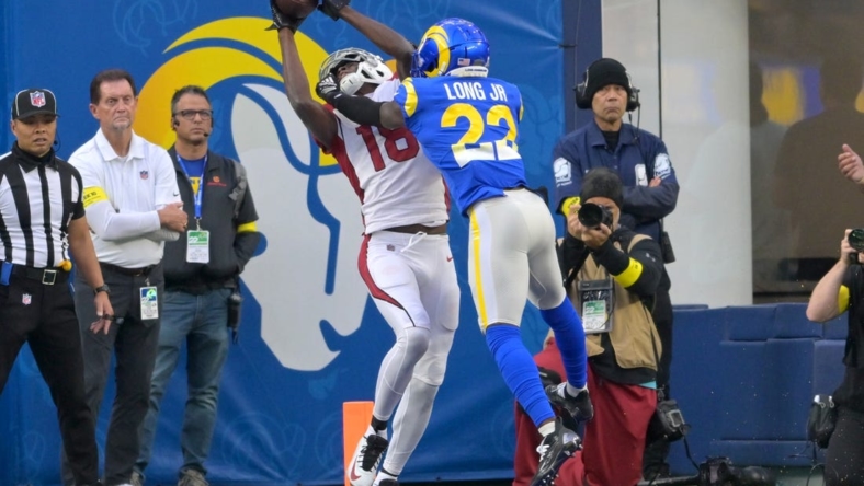 Nov 13, 2022; Inglewood, California, USA;  Arizona Cardinals wide receiver A.J. Green (18) catches the ball in front of Los Angeles Rams cornerback David Long Jr. (22) for a touchdown in the first half at SoFi Stadium. Mandatory Credit: Jayne Kamin-Oncea-USA TODAY Sports