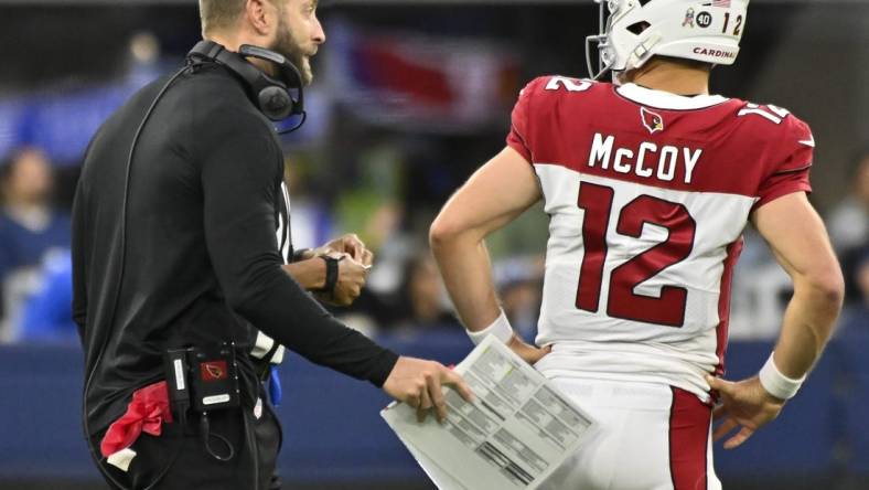 Nov 13, 2022; Inglewood, California, USA; Arizona Cardinals head coach Kliff Kingsbury talks to quarterback Colt McCoy (12) during the fourth quarter against the Los Angeles Rams at SoFi Stadium. Mandatory Credit: Robert Hanashiro-USA TODAY Sports