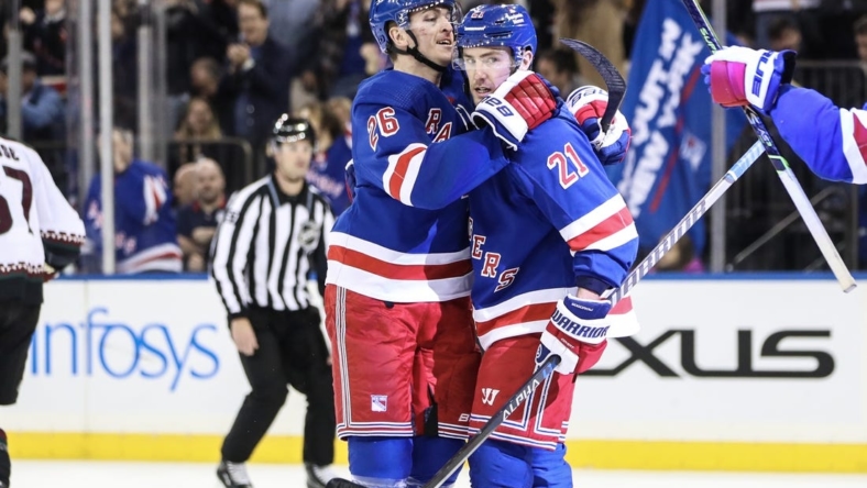 Nov 13, 2022; New York, New York, USA;  New York Rangers center Barclay Goodrow (21) celebrates with left wing Jimmy Vesey (26) after scoring a goal in the second period against the Arizona Coyotes at Madison Square Garden. Mandatory Credit: Wendell Cruz-USA TODAY Sports