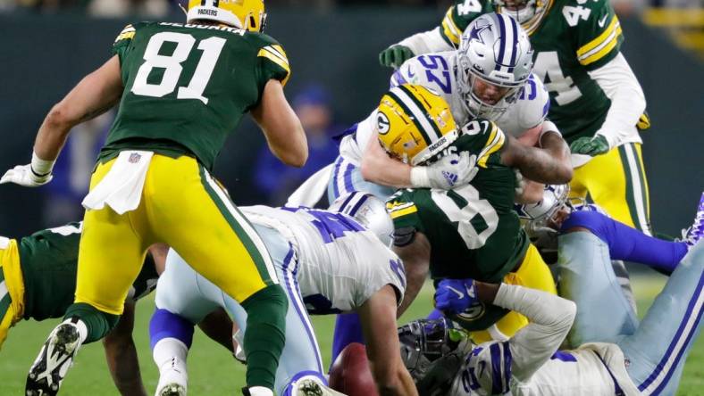 Green Bay Packers wide receiver Amari Rodgers (8) fumbles a punt return against the Dallas Cowboys during their football game Sunday, November 13, at Lambeau Field in Green Bay, Wis. Dallas recovered the fumble.Dan Powers/USA TODAY NETWORK-Wisconsin

Apc Packvscowboys 1113221314djp