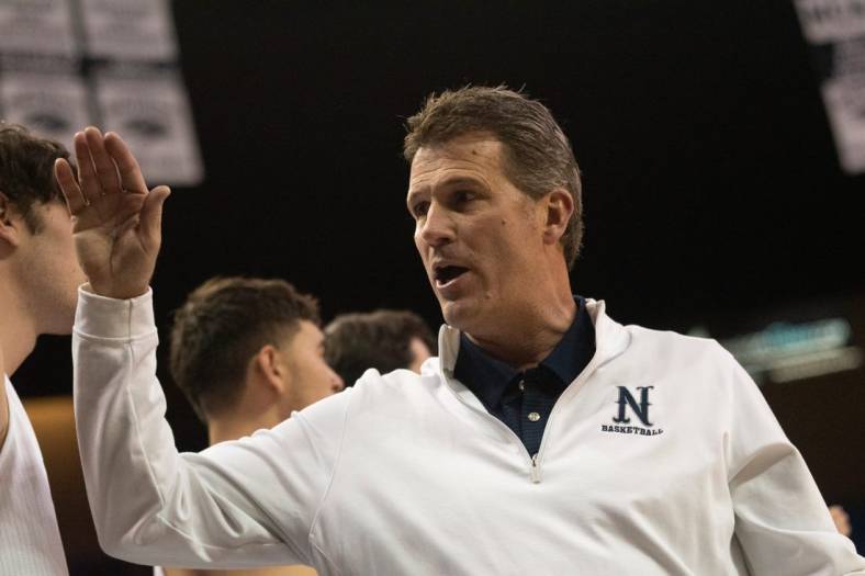 Head coach Steve Alford gives high fives to the team as Nevada wins against Grand Canyon University at Saturday's match at Lawlor Events Center in Reno, NV on Nov. 12, 2022.

Nevada Vs Grand Canyon 16