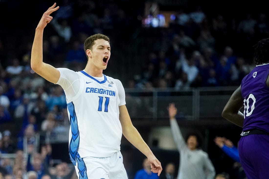 Nov 14, 2022; Omaha, Nebraska, USA; Creighton Bluejays center Ryan Kalkbrenner (11) celebrates after a 3-pointer against the Holy Cross Crusaders during the first half at CHI Health Center Omaha. Mandatory Credit: Dylan Widger-USA TODAY Sports